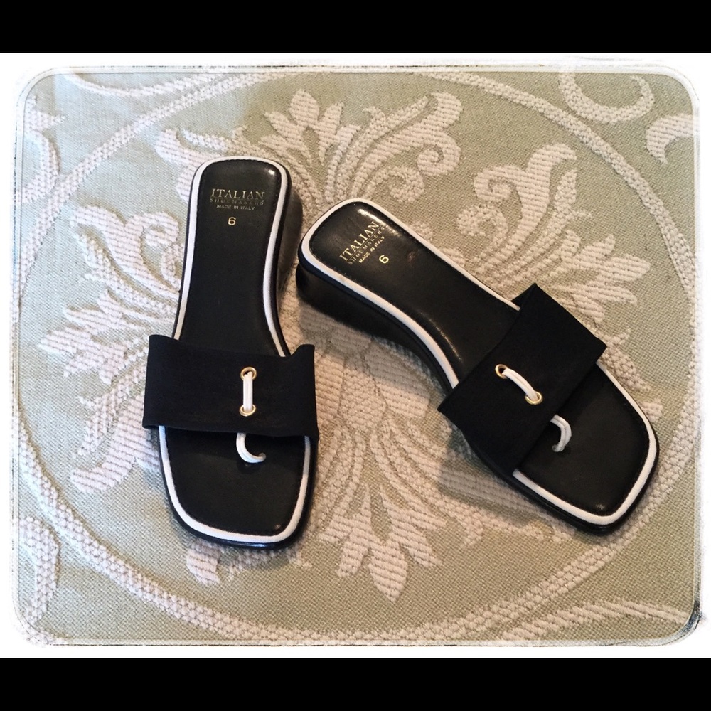 “Italian Shoemakers” Black and White Flip Flops.